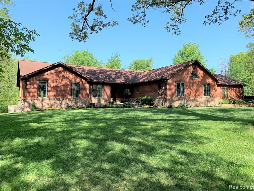 222 S Hacker Rd, Brighton, MI 48114 - photo 1