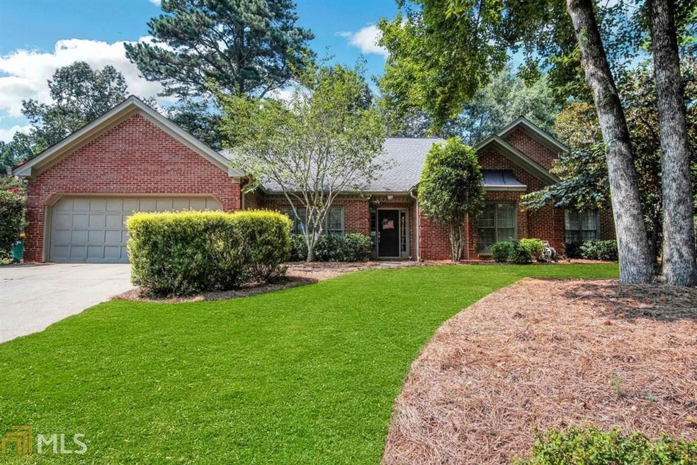 Welcome home to this gorgeous brick-front ranch in