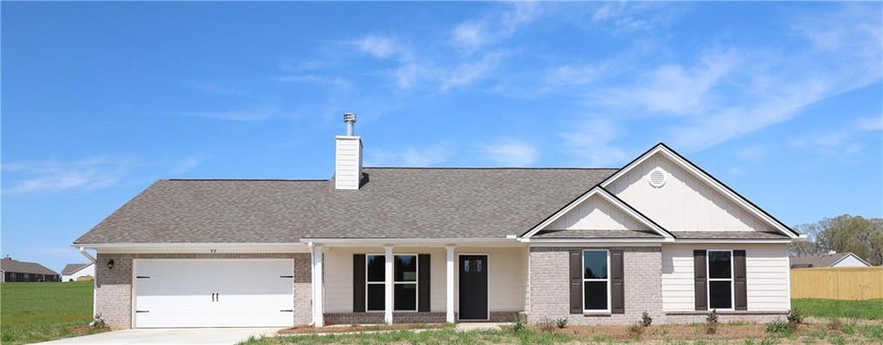 View of front of home featuring a garage