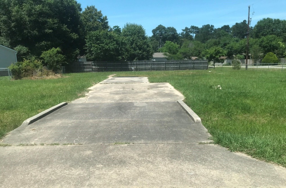 This premium corner lot is ready for your mobile home a 28x40 slab is already there.