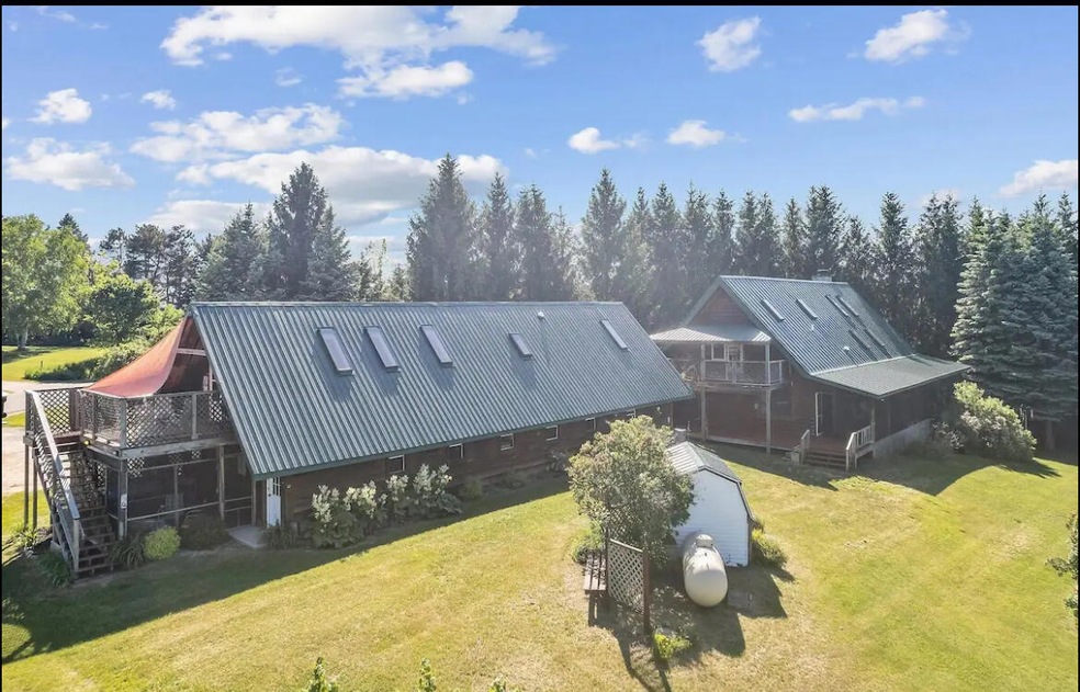 9735 Quarterline Rd, Charlevoix, MI 49720 - photo 1