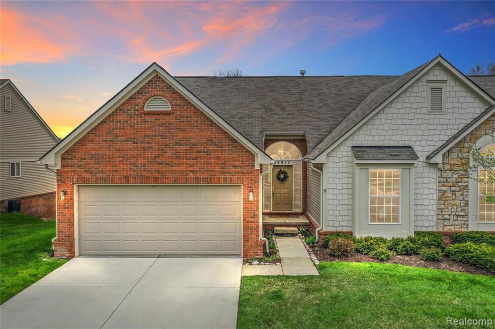 Curb view, attached front entry garage