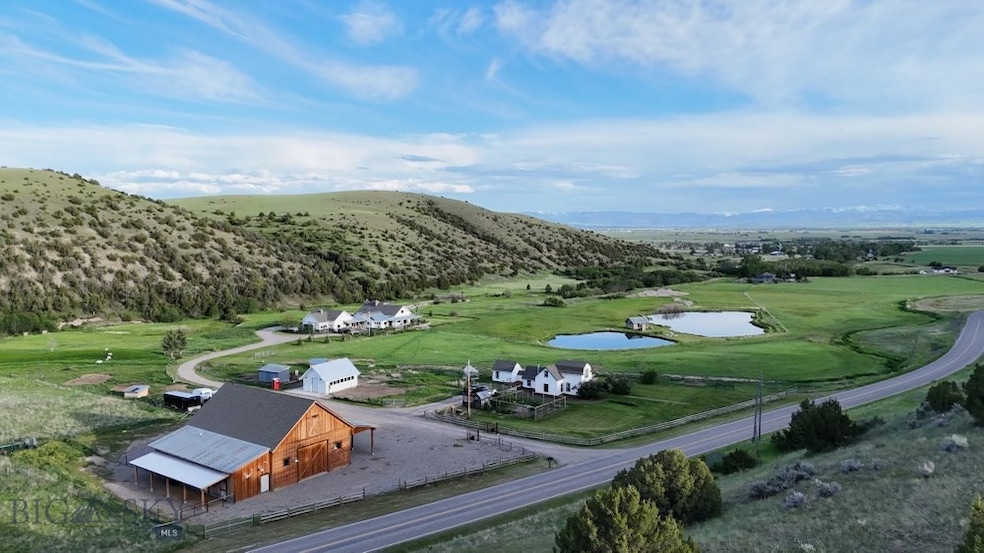 32 acres surrounded by large parcels