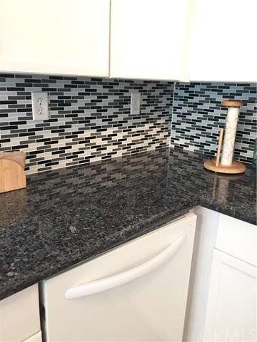 MODERN CUSTOM BACKSPLASH TO ACCENT THE GORGEOUS GR