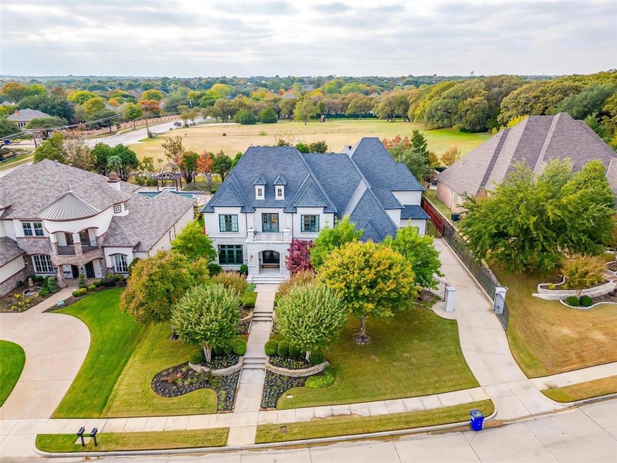 French Chateau inspired home on 0.44 acre lot and backed up to private estate.