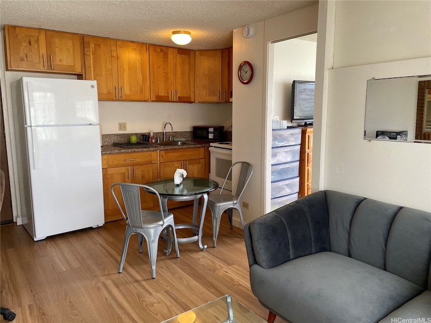 Five Regents unit 1305, Honolulu, HI 96818 - photo 1