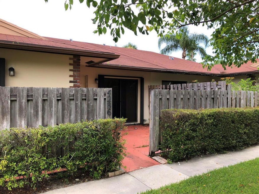 4286 Woodstock Dr unit C, West Palm Beach, FL 33409 - photo 1