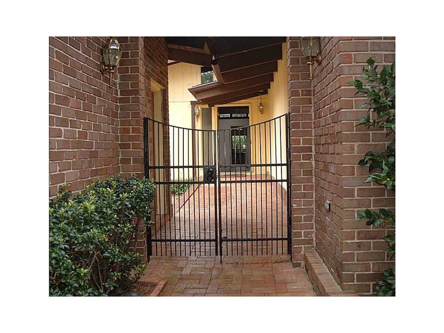 Exterior Front. Gated Entry