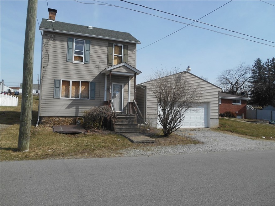 Front of house and 2 car garage