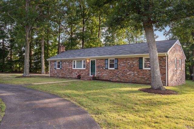 Classic brick ranch with new roof.