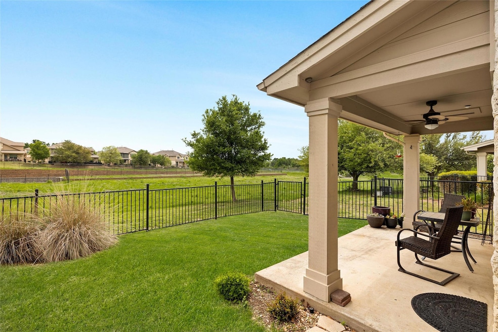 View of yard with a patio, a fenced backyard, and