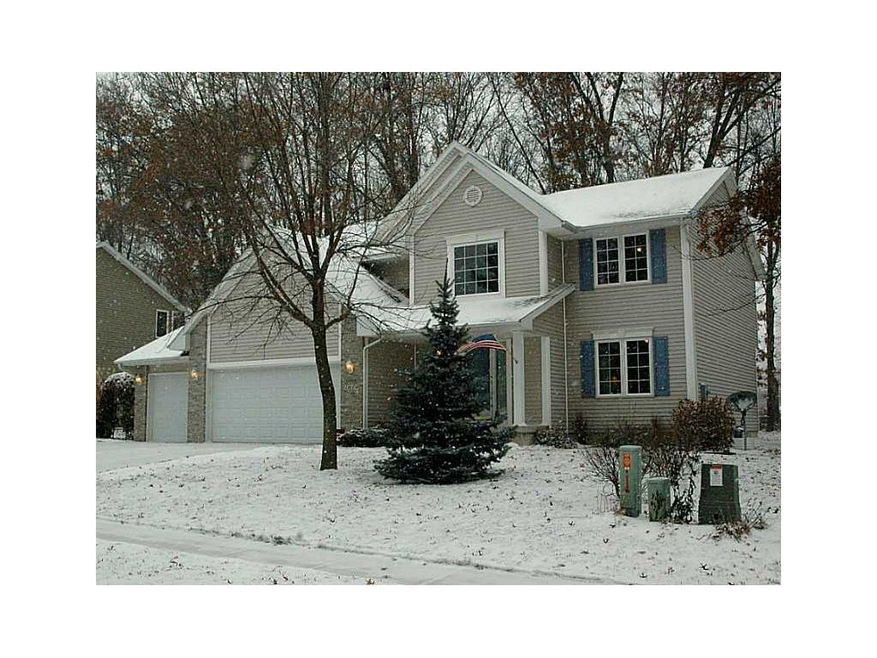 Front Exterior. Mature treed Lot, covered front po