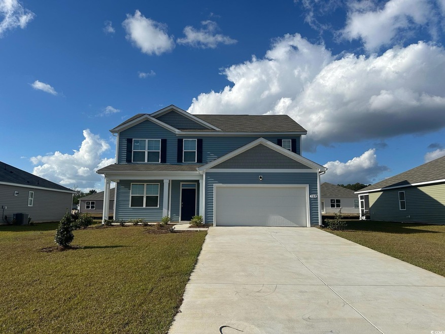 View of front of property featuring a front yard, 