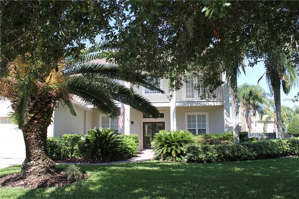 Front entrance  with Canary Island Date Palm and n