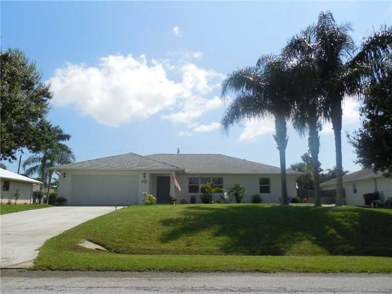 Exterior Front. Beautiful Palm trees shade the fro