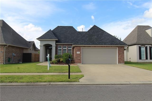Updated house front with new garage door installed