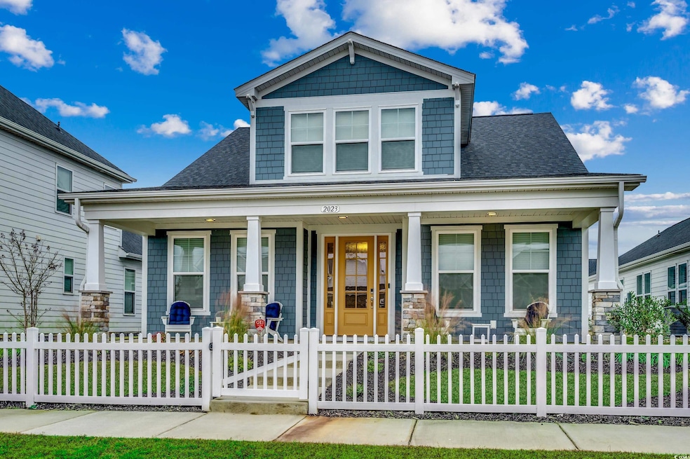 View of front of property with covered porch