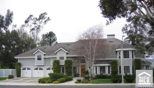 This gracious home invites you into a serene and r
