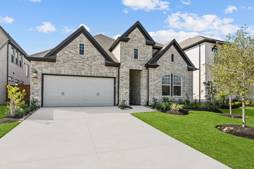 Welcome to The Danbridge by David Weekley Homes. M