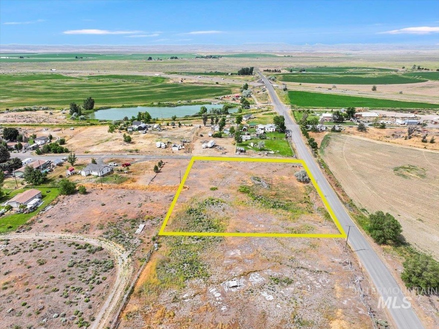 View of rural area featuring a large body of water and property boundaries highlighted