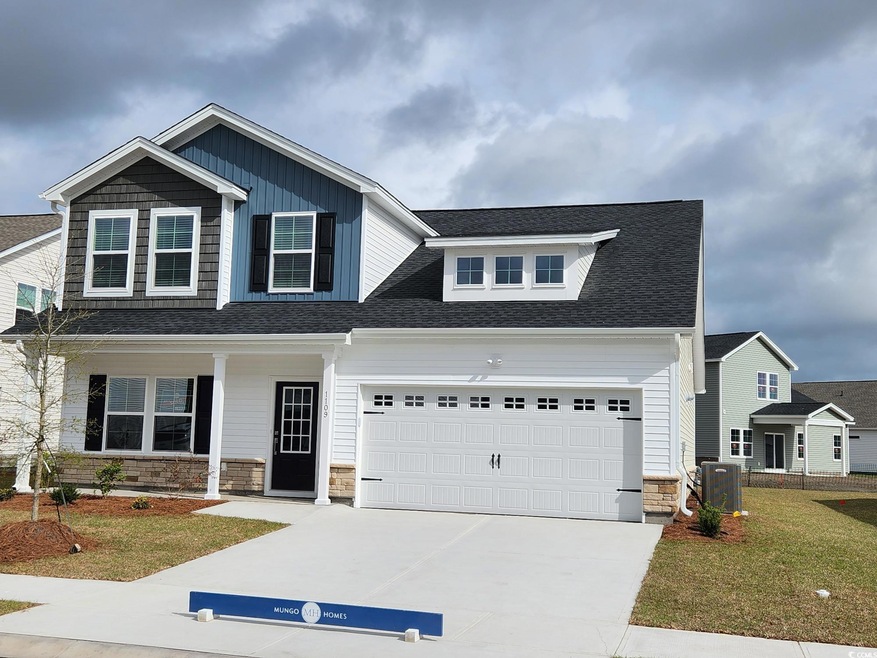 View of front of home with stone siding, central a