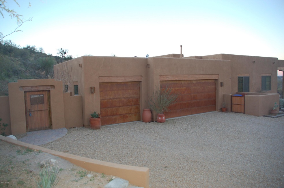 front view showing entry courtyard gate