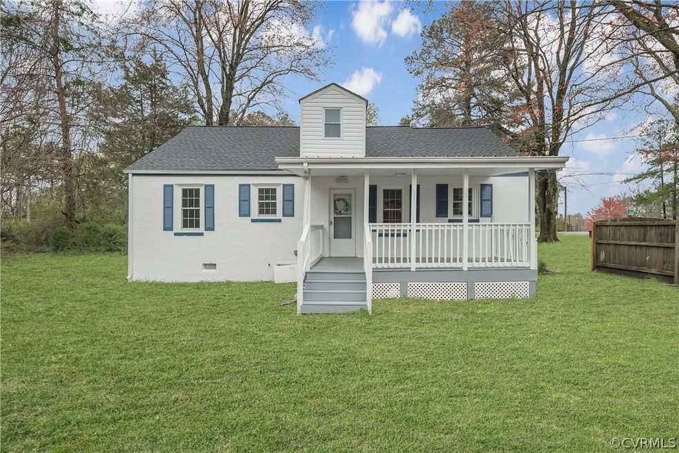 View of front of property featuring a porch and a