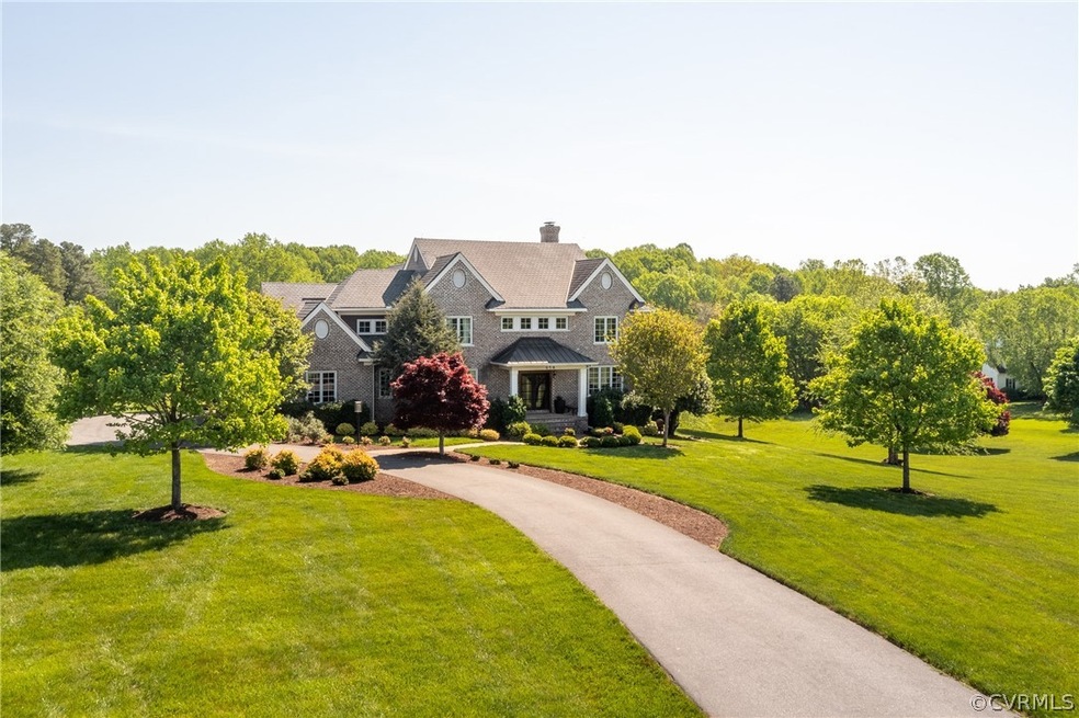 Custom-built brick home on over 5.5 acres in The M