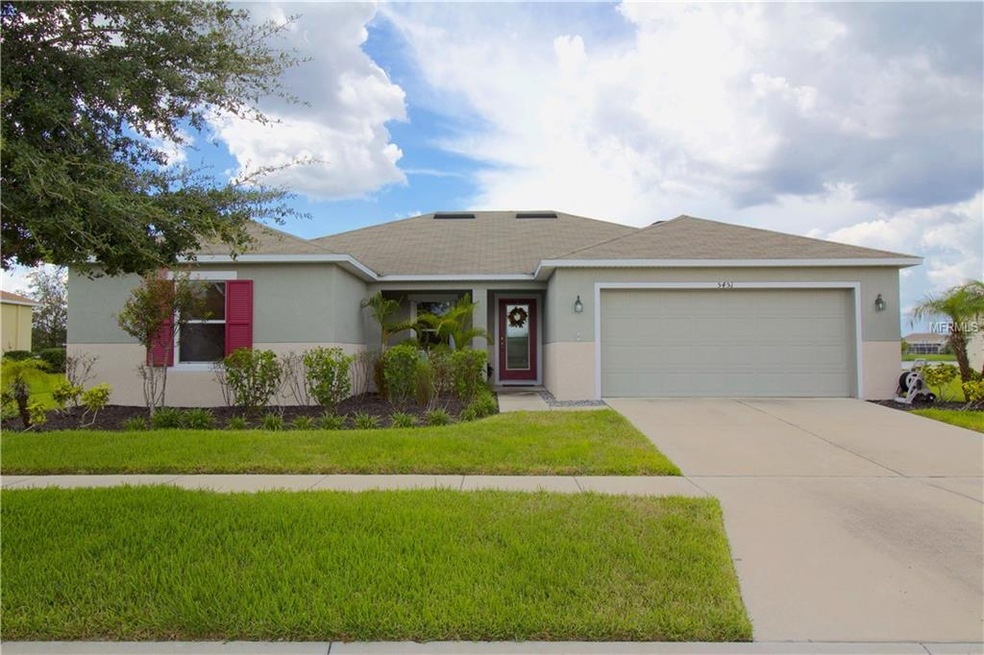 With a beautiful front yard, and a gorgeous lakevi