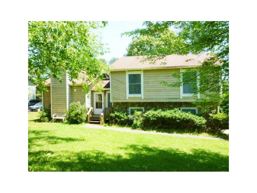 Exterior Front. Split level home with side entry g