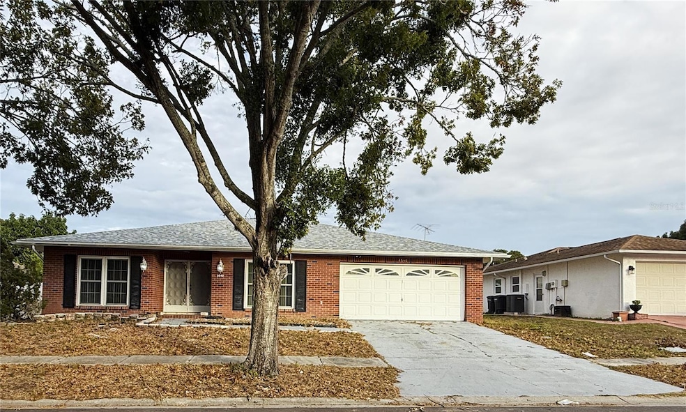 8840 Martinique Ln, Port Richey, FL 34668 - photo 1
