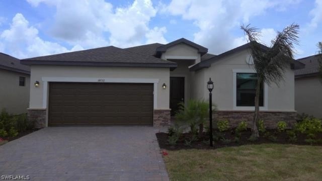View of front of home with a garage