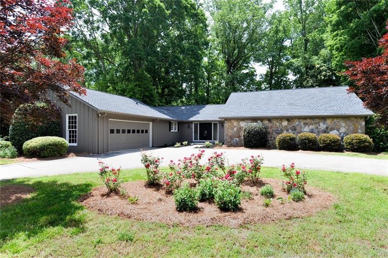 YOU WILL LOVE THIS FOUR BEDROOM RANCH ON ONE ACRE 