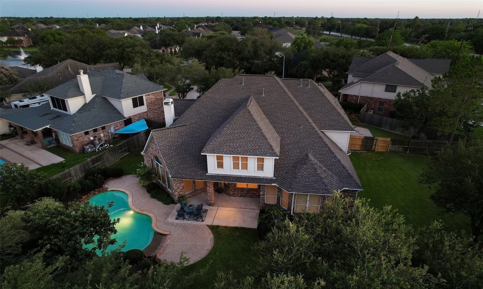 This stunning home features 4 bedrooms, 3.5 baths, 3 car garage, 2 downstairs office area, enormous upstair game room, study niche, and a 