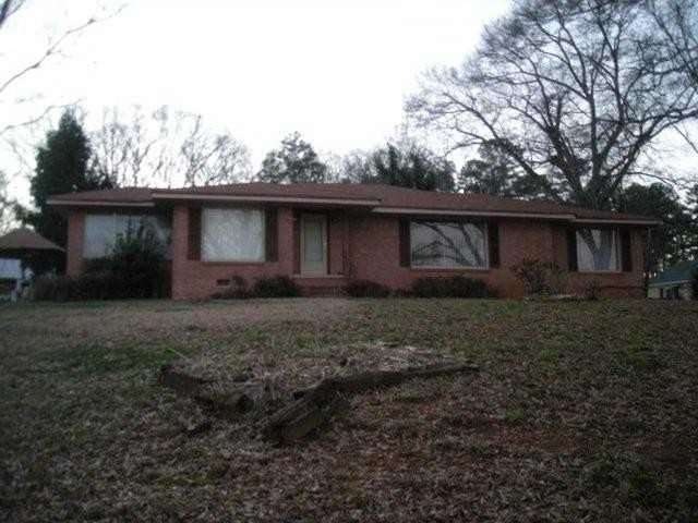 Exterior Front. Gorgeous 4-sided brick ranch home 