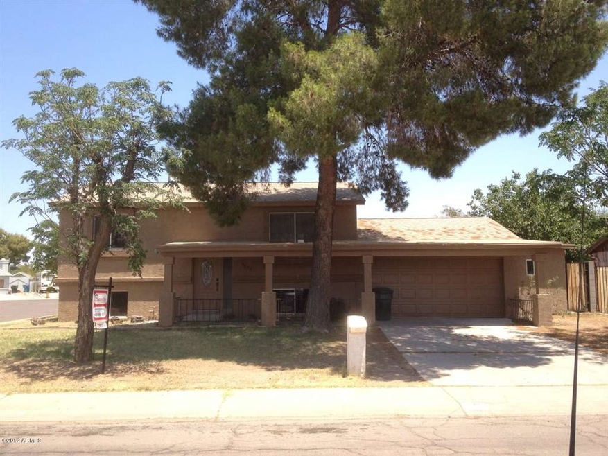 Huge trees shade the home