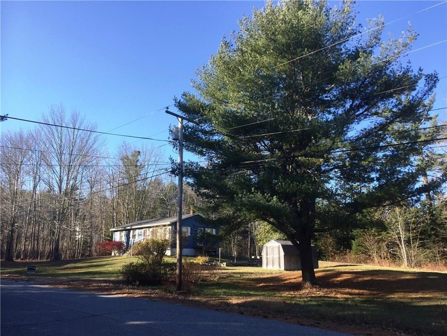 Mature pine and hardwood trees cover...