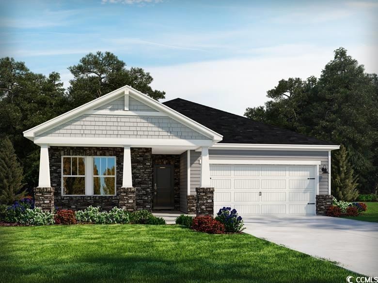 View of front of house featuring a garage and a fr
