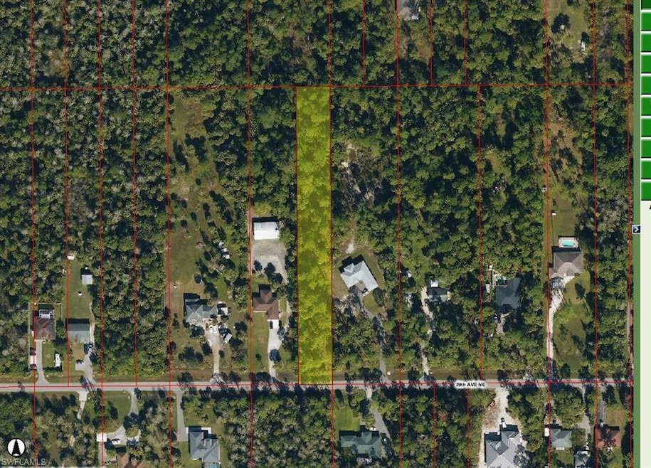 Aerial overview of property's location featuring property parcel outlined