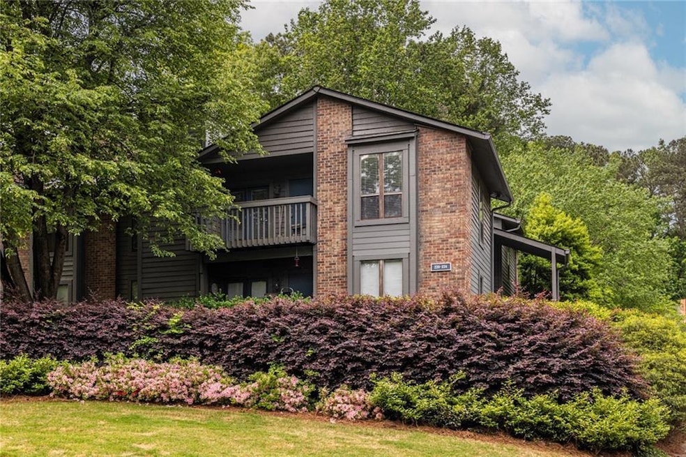 Charming top-floor condo nestled in a beautifully 