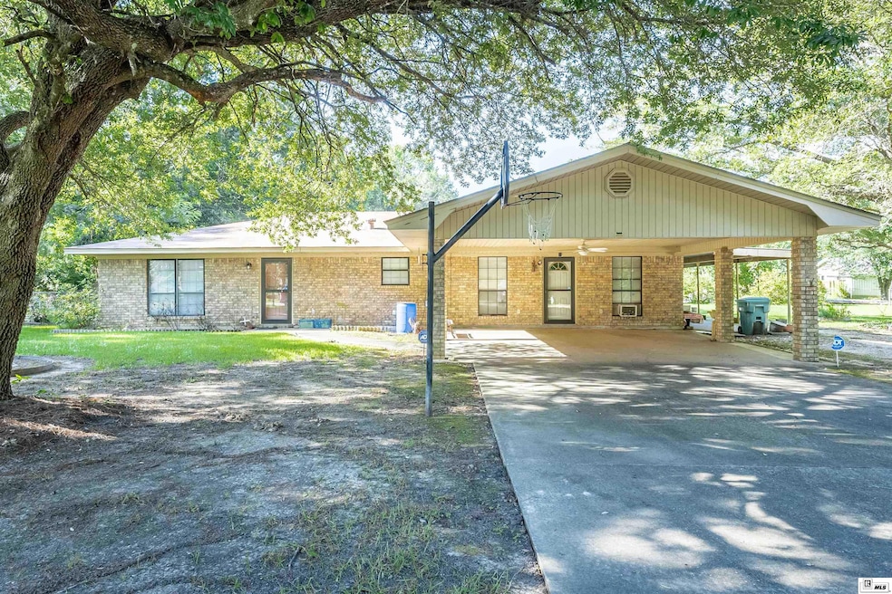 6065 Osborn Rd, Bastrop, LA 71220 - photo 1