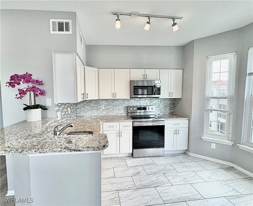 23520 Walden Center Dr unit 303, Estero, FL 34134 - photo 1