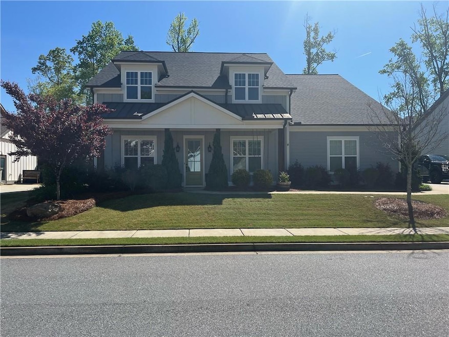 View of front of house with a front lawn