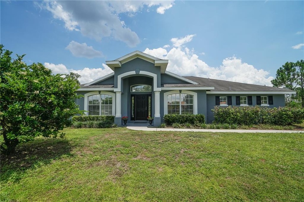 2265 Bronco Dr, Saint Cloud, FL 34771 - photo 1