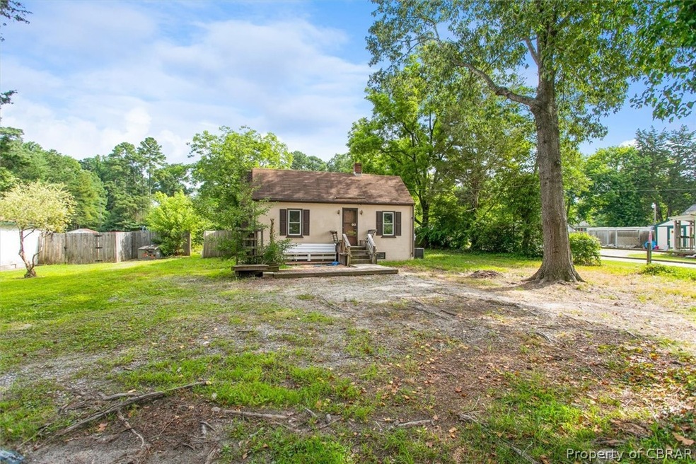Front of property with large front yard