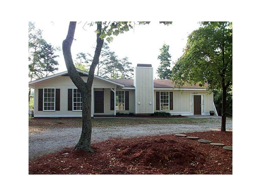Exterior Front. Lovely updated 3/2 ranch on great 