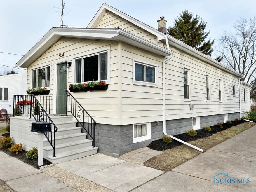 Exterior Front-New Landscape, painted foundation/s