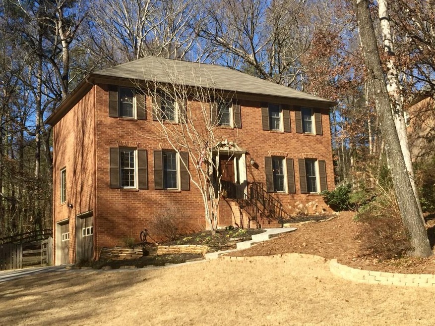Beautiful, 3 sided brick and cement siding, tradit