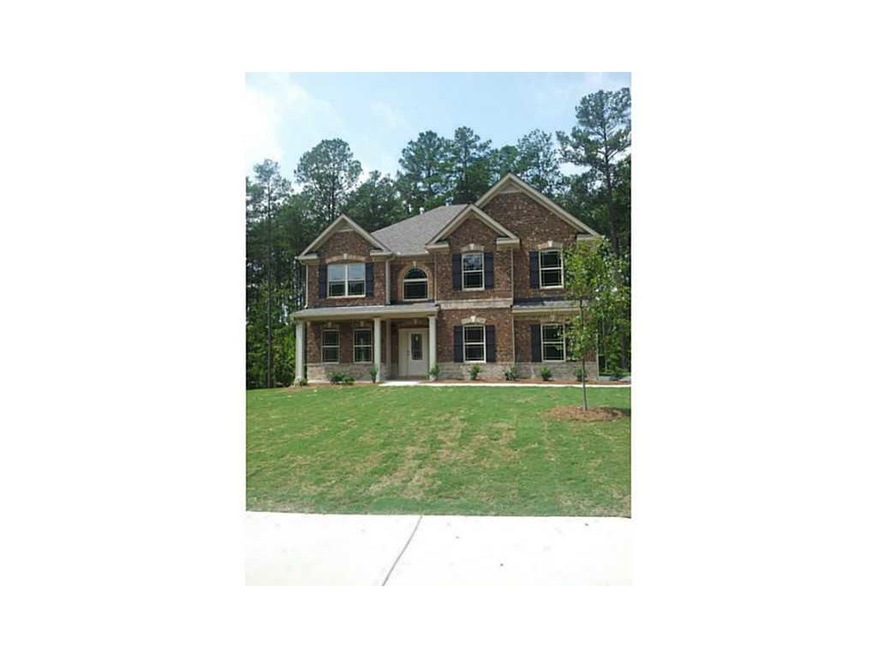 Exterior Front. Large homesite with side entry gar