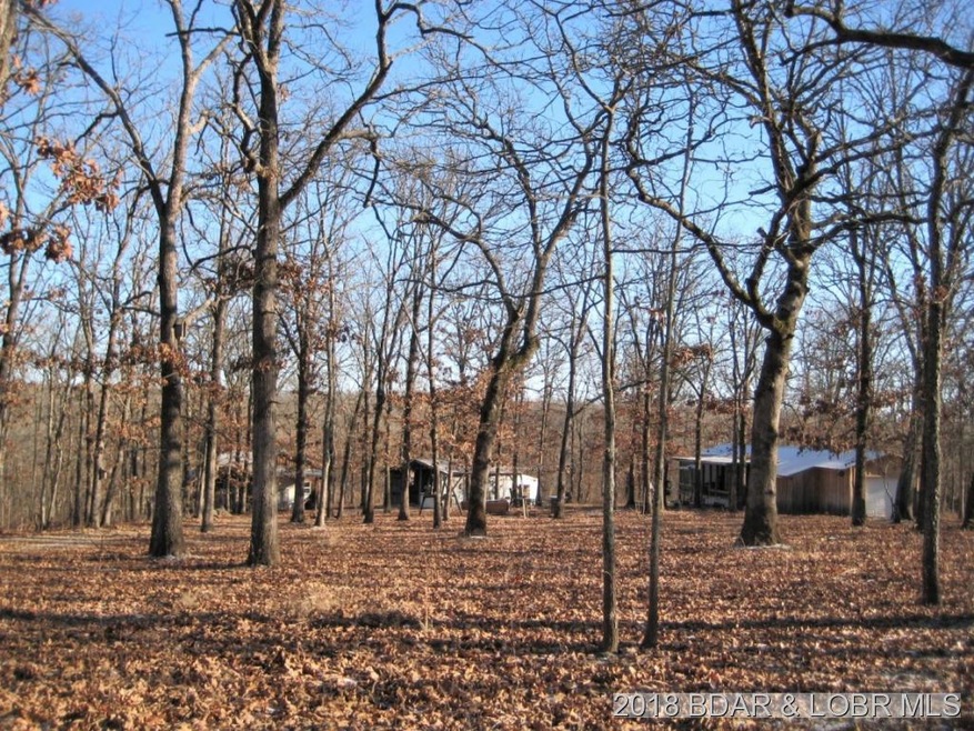 27 acres with home  buildings